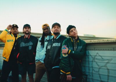 THE WHOADEES GROUP PHOTO ROOFTOP WAIST UP